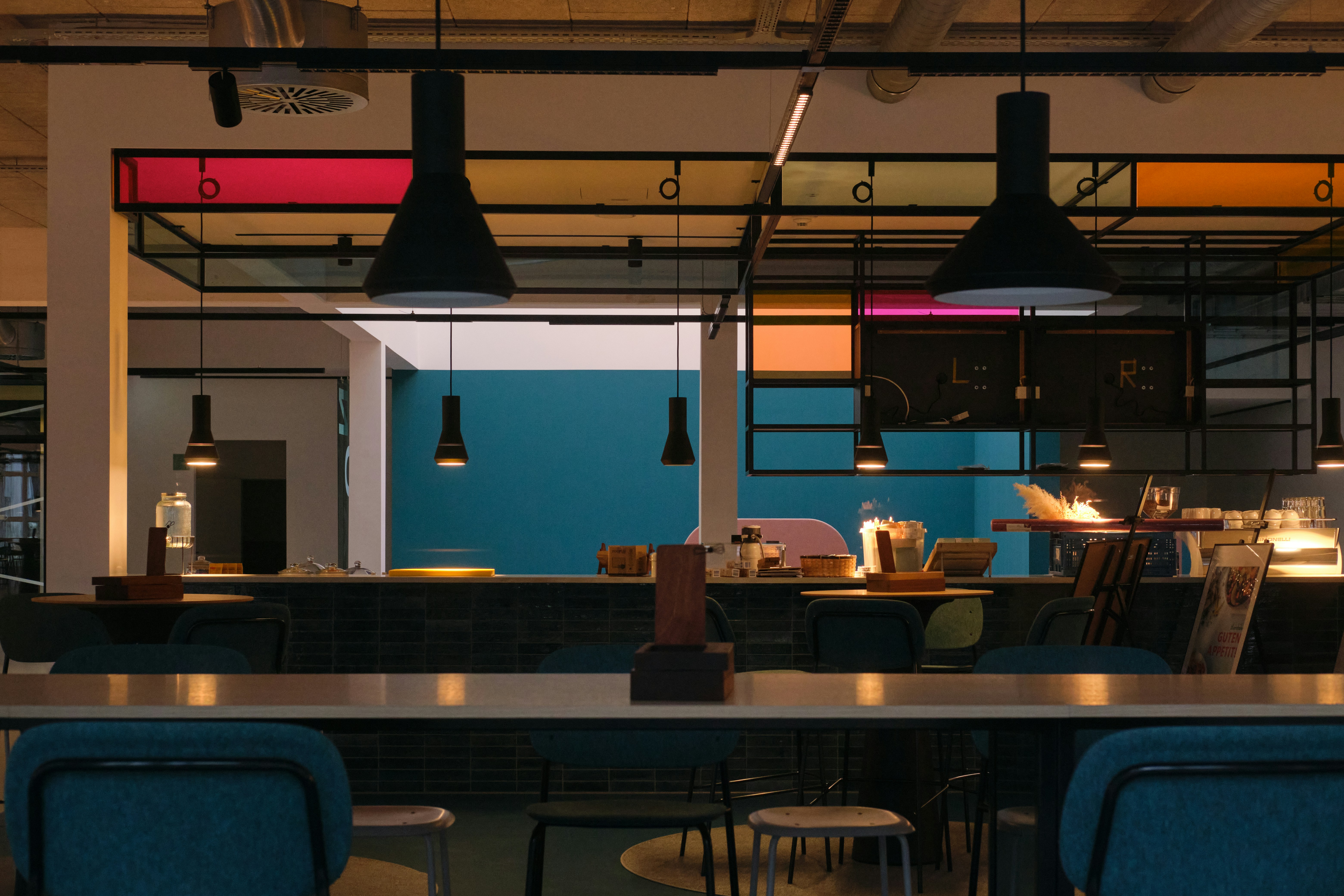 Upgraded cafe interior with warm lighting and modern finishes